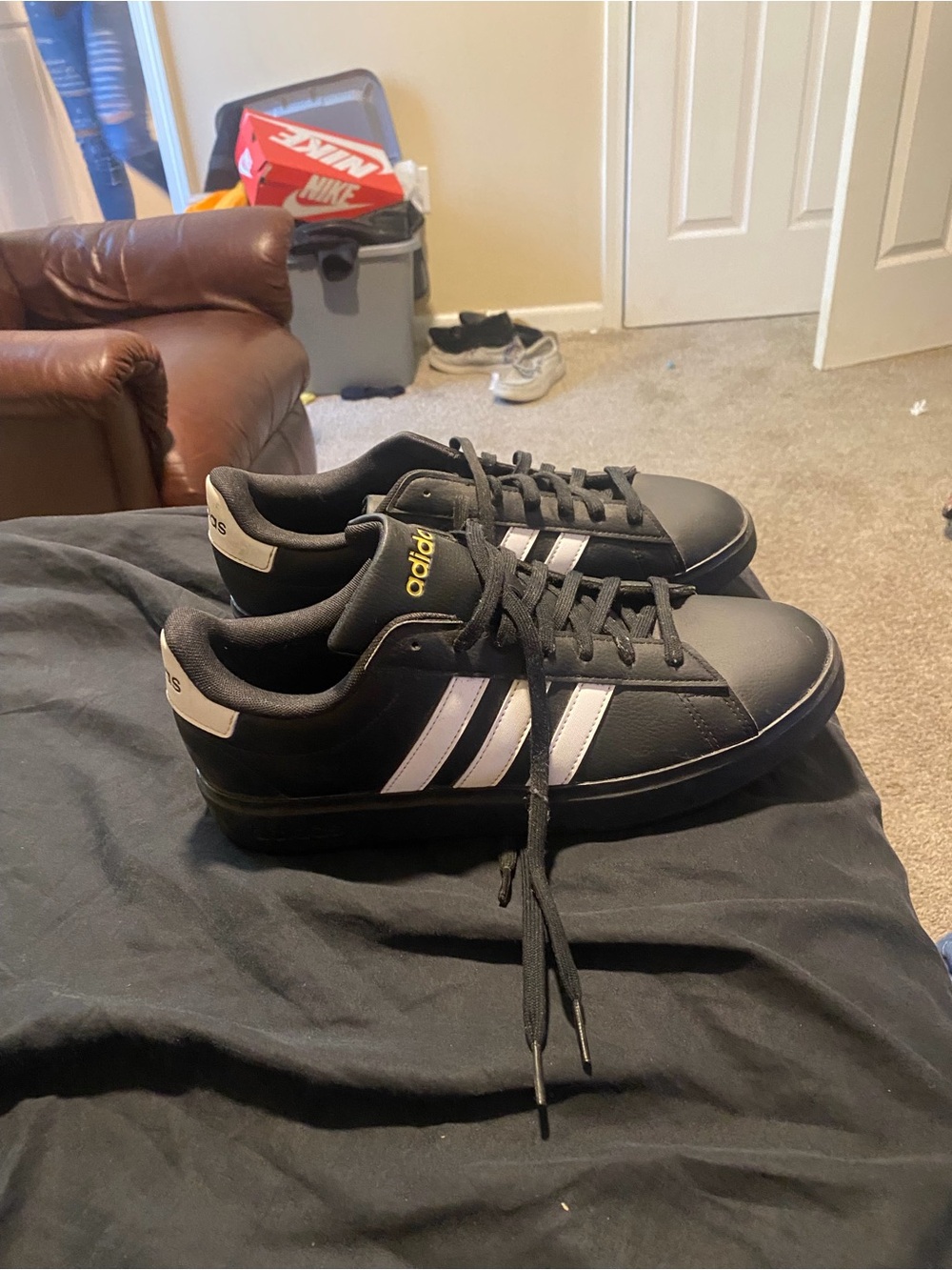 adidas Black Athletic Sneakers with White Stripes